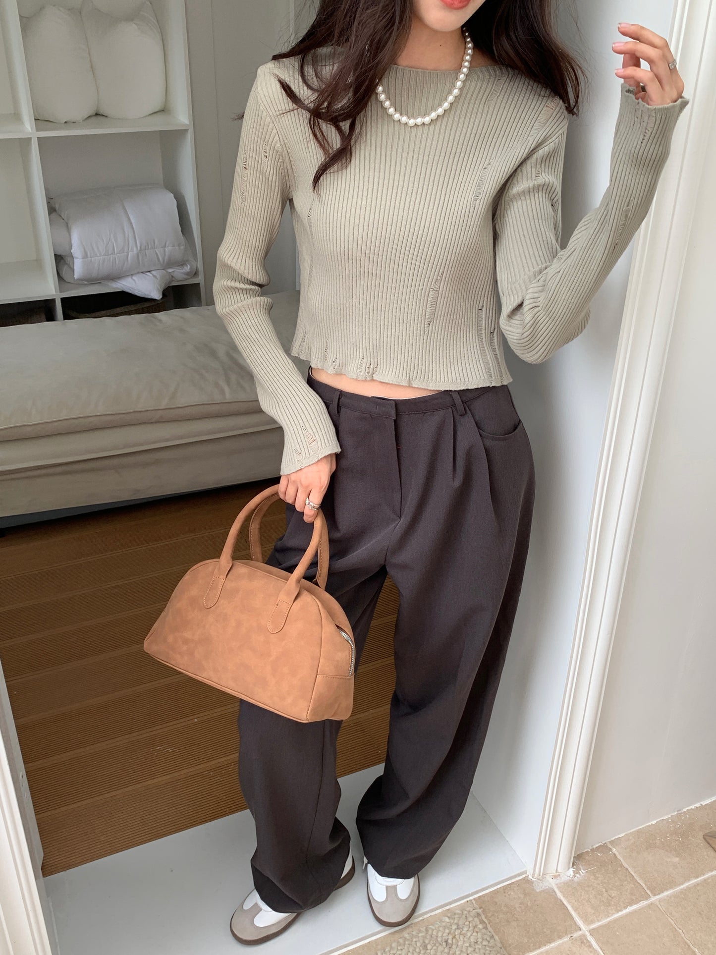 Tassel distressed knit top