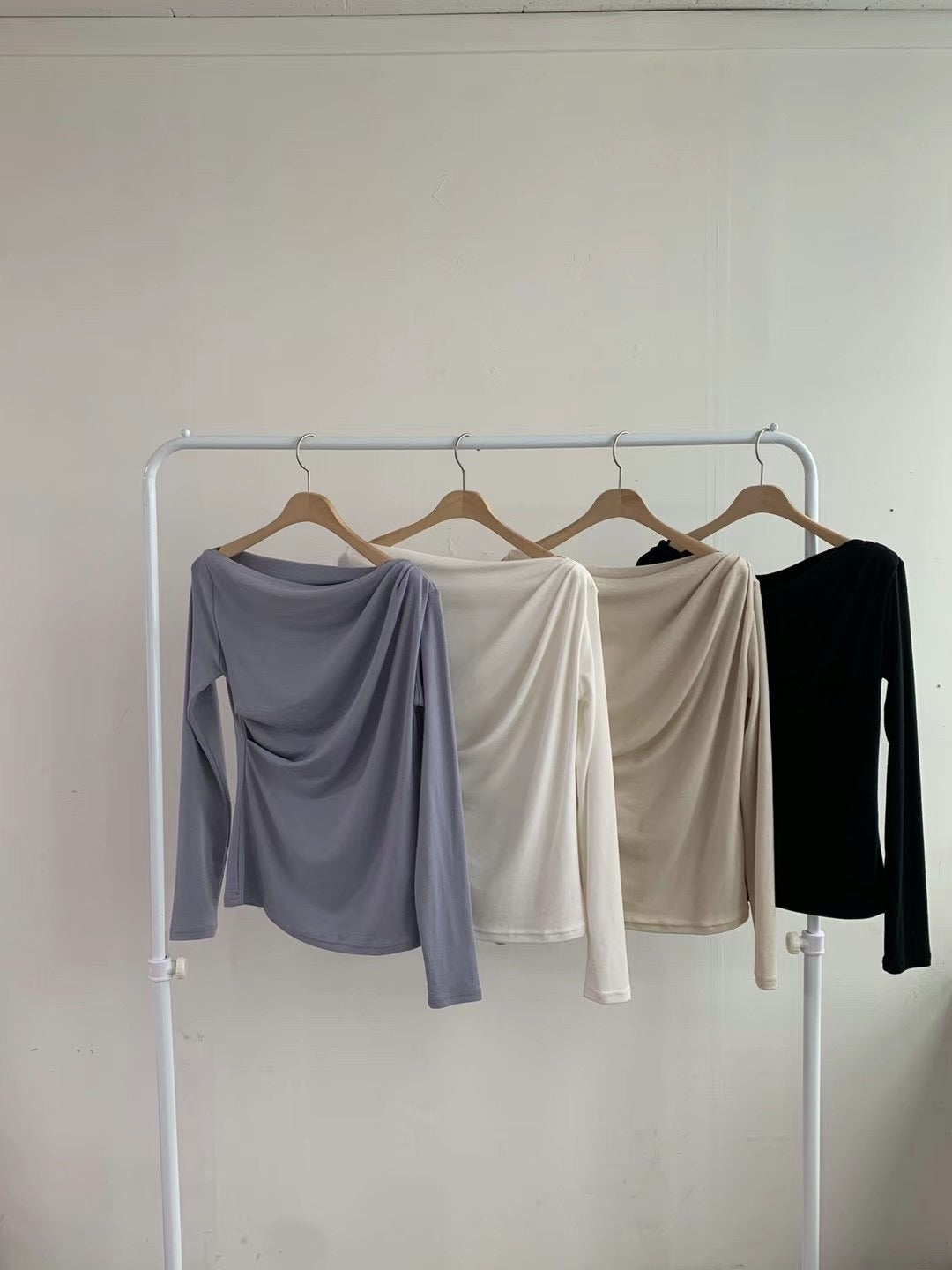 Off-shoulder pleated blouse