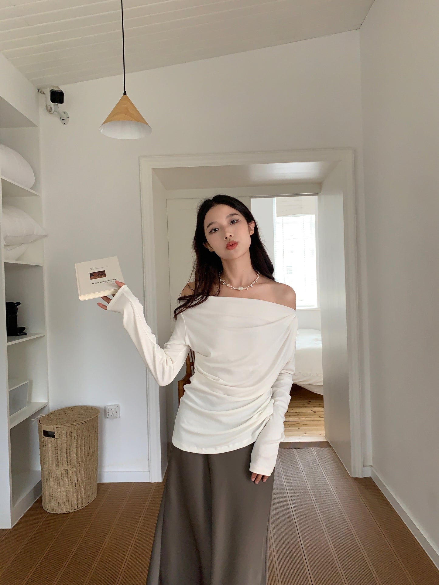Off-shoulder pleated blouse