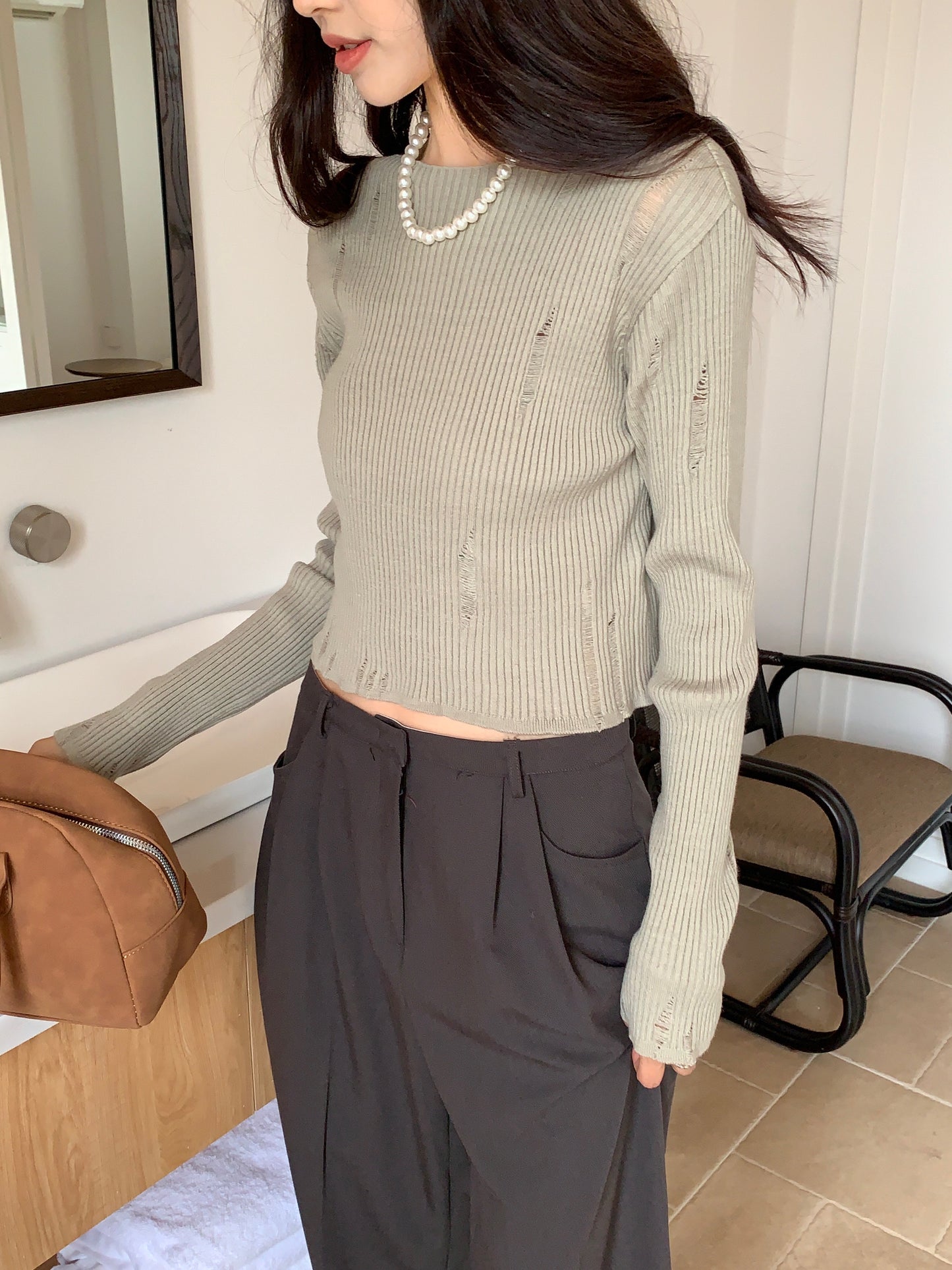 Tassel distressed knit top