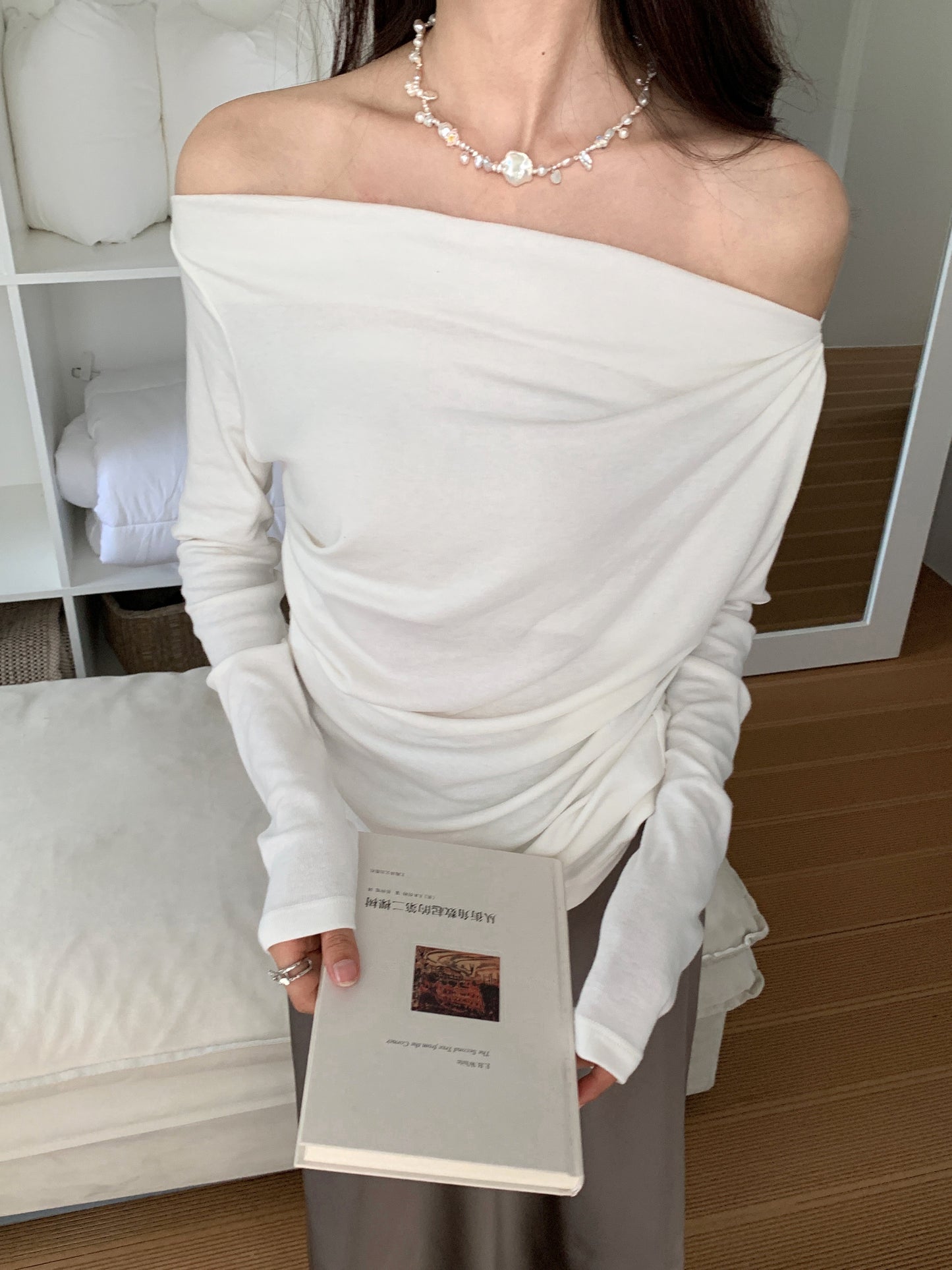 Off-shoulder pleated blouse