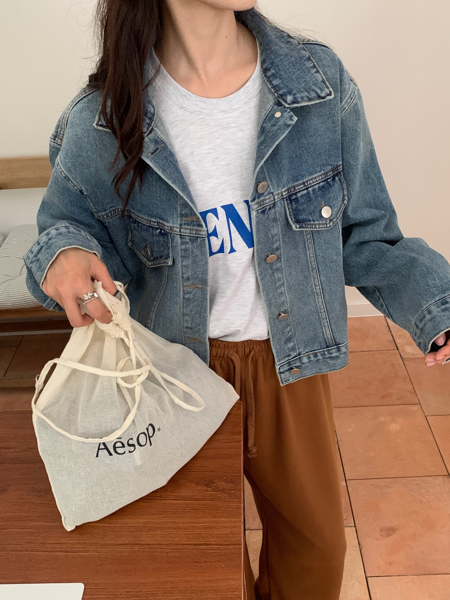 Worn washed denim jacket