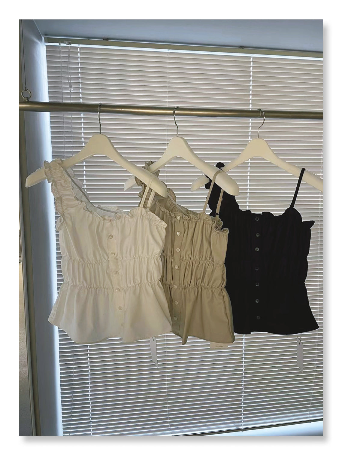 H02120 Ruffled one-shoulder vest