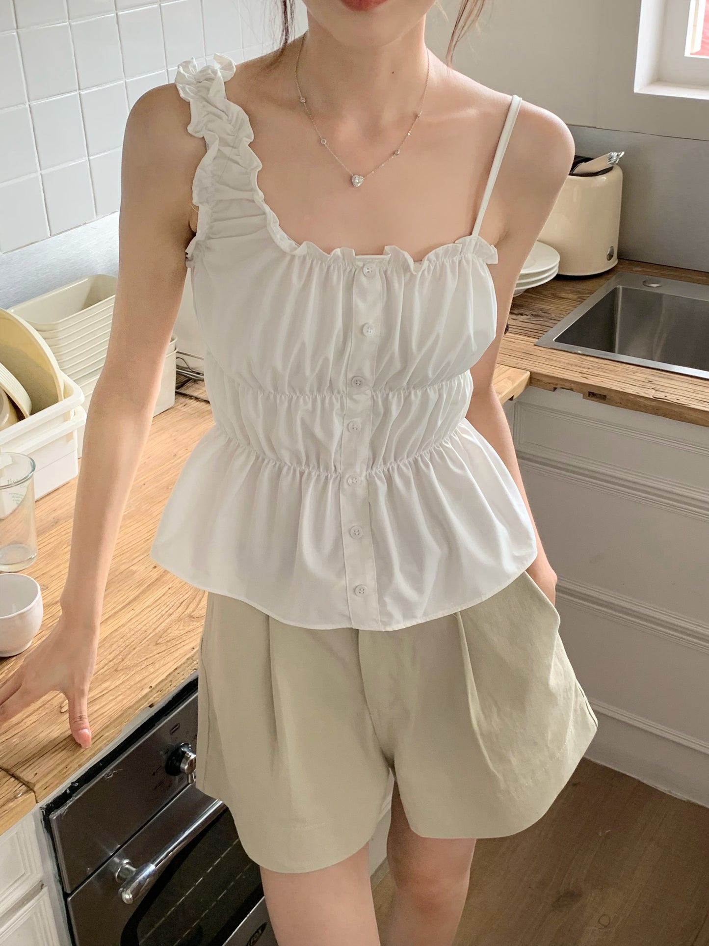 H02120 Ruffled one-shoulder vest